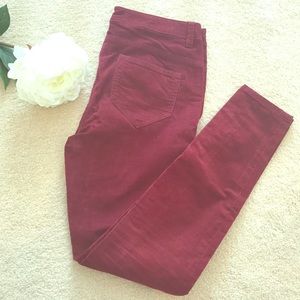 Burgundy corduroy skinny pants.